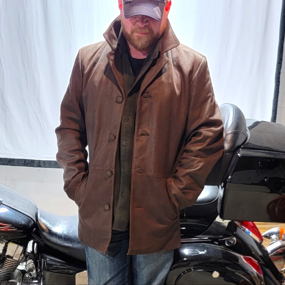 Wilson’s brown leather. "Dean winchesters" hero coat.